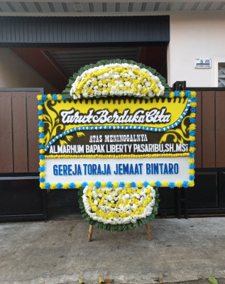 Papan Bunga Duka di Pasar Jambi